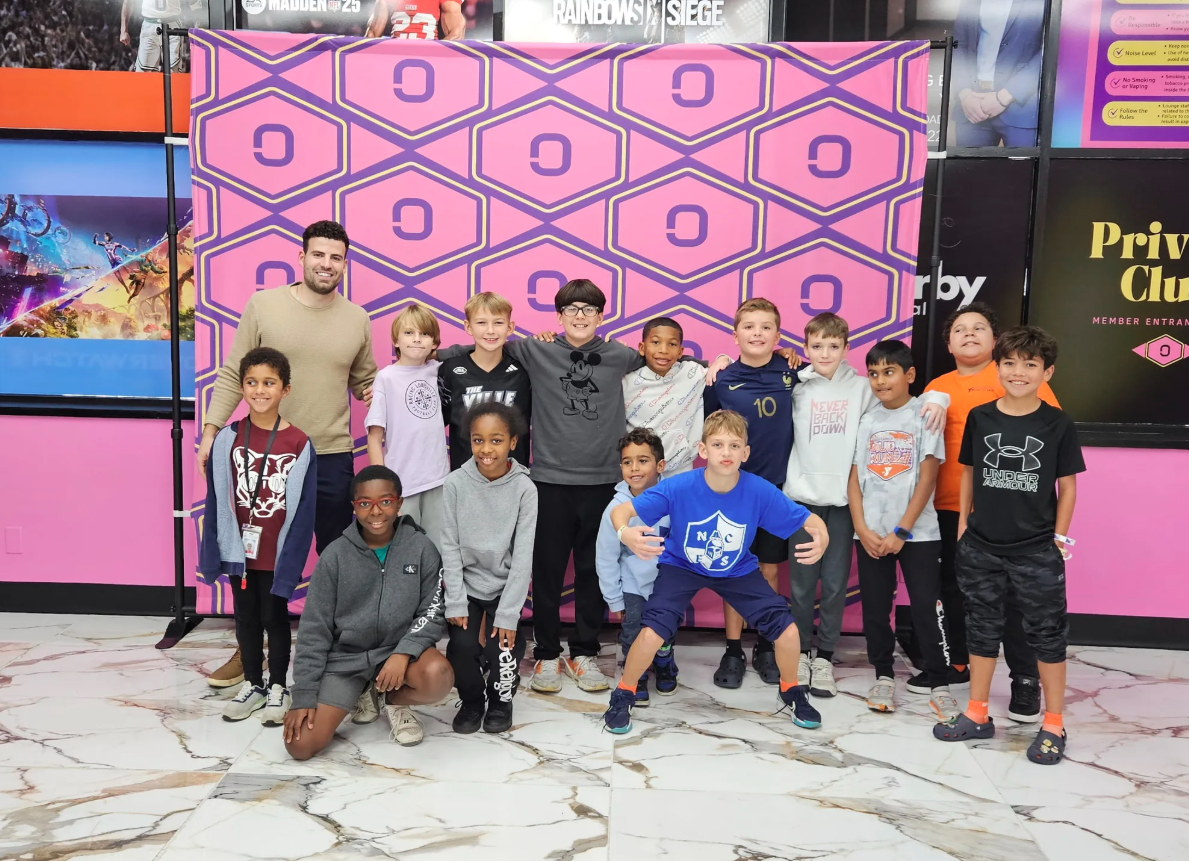 Kids enjoying a video game birthday party at Olympus Gaming Lounge