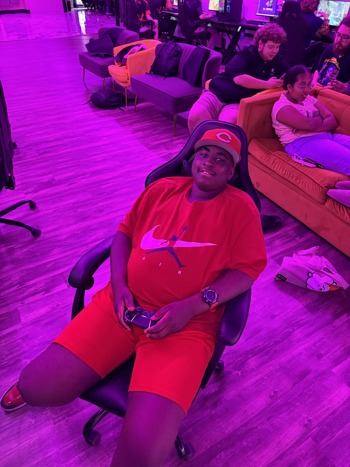 Player relaxing on the couch with a controller