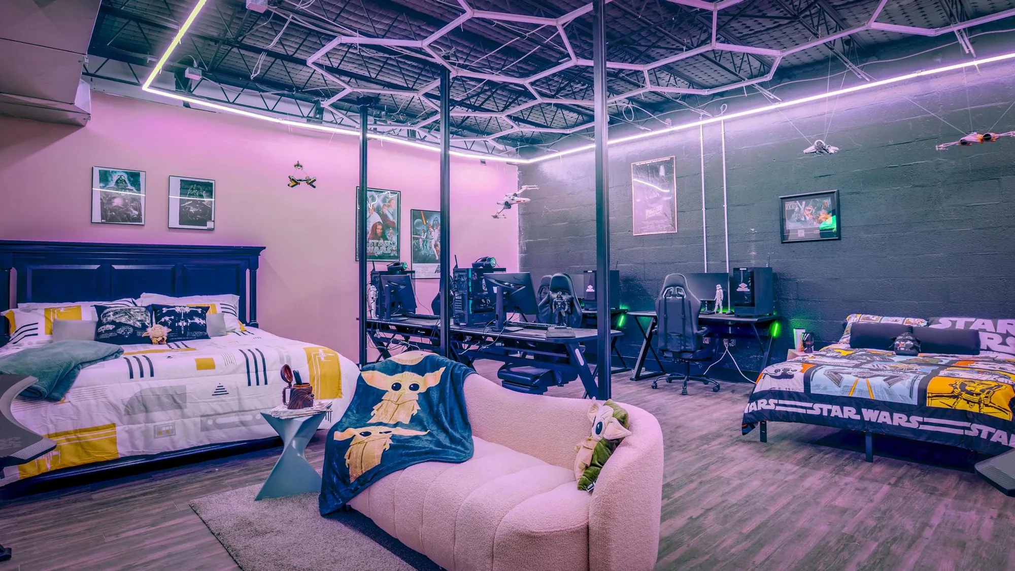 Star Wars themed overnight room with bed and gaming desk